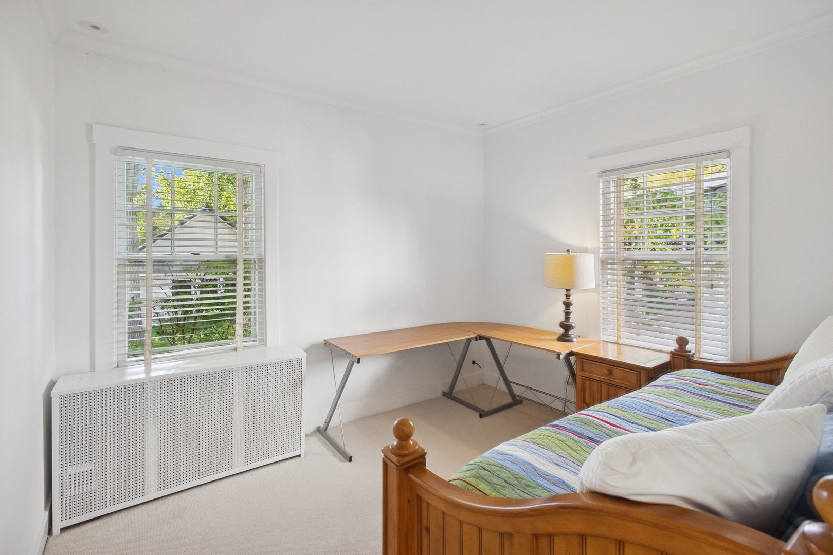228 Poplar Street Winnetka, IL 60093 - Photo 15 of 34 a bedroom with furniture and windows
