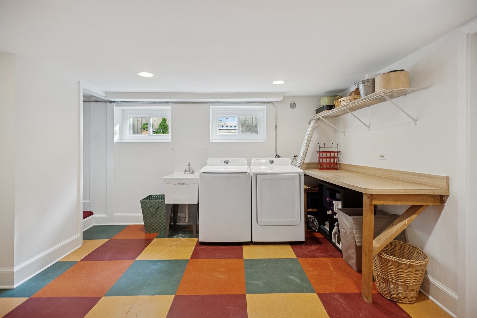 228 Poplar Street Winnetka, IL 60093 - Photo 25 of 34 a utility room with cabinets and washer
