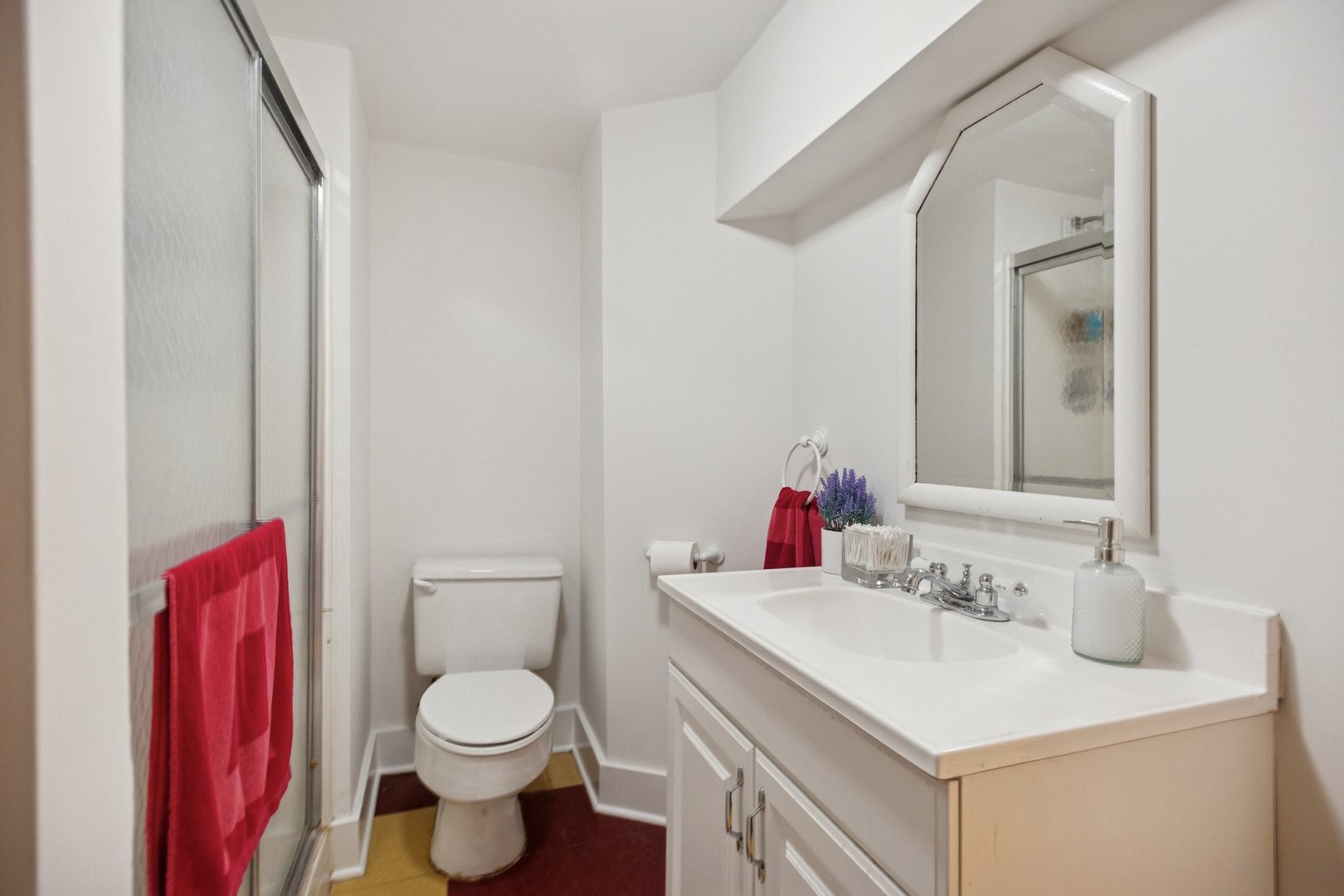 228 Poplar Street Winnetka, IL 60093 - Photo 26 of 34 a bathroom with a sink vanity mirror and toilet