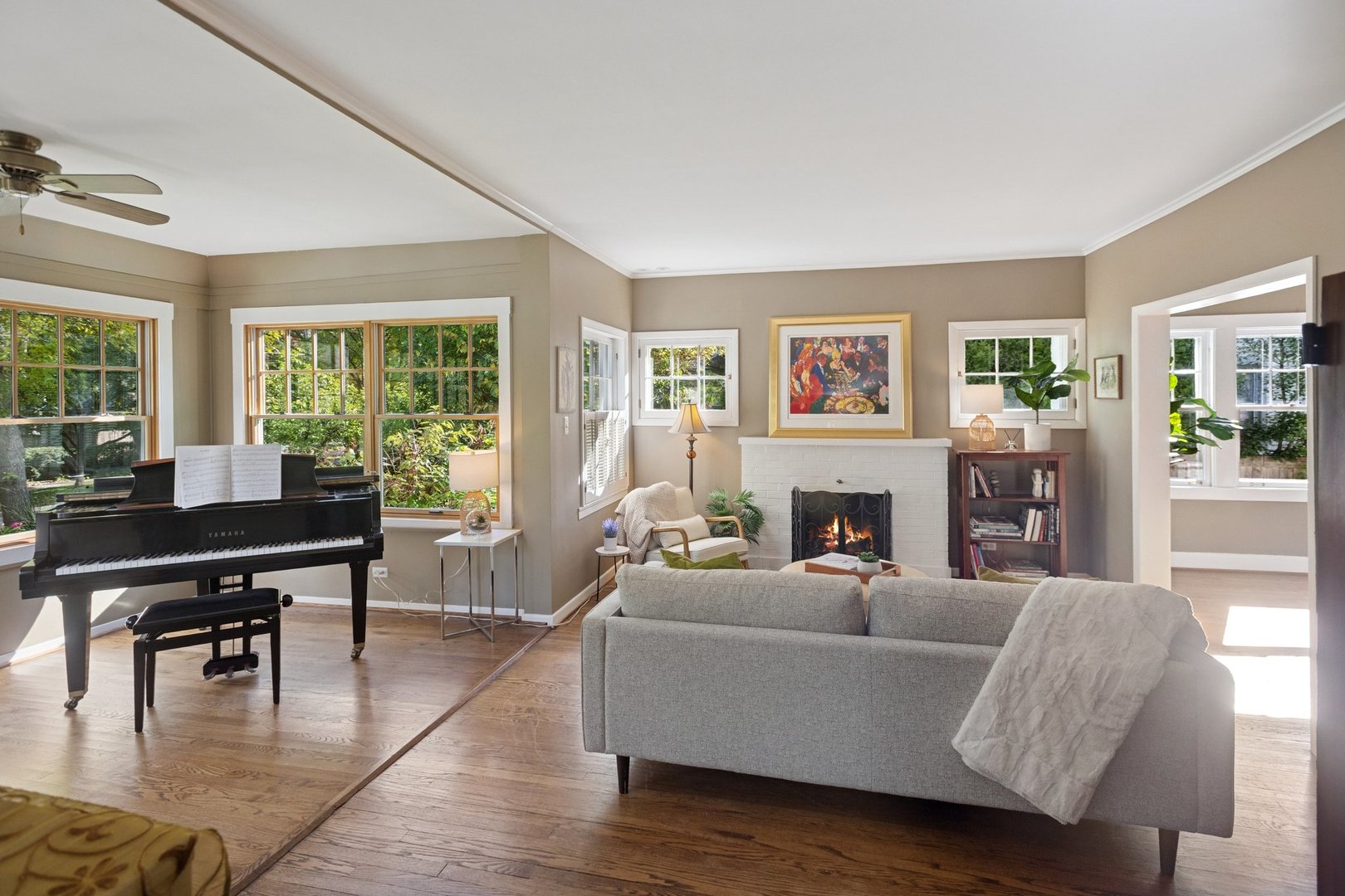 228 Poplar Street Winnetka, IL 60093 - Photo 4 of 34 a living room with furniture fireplace and a table