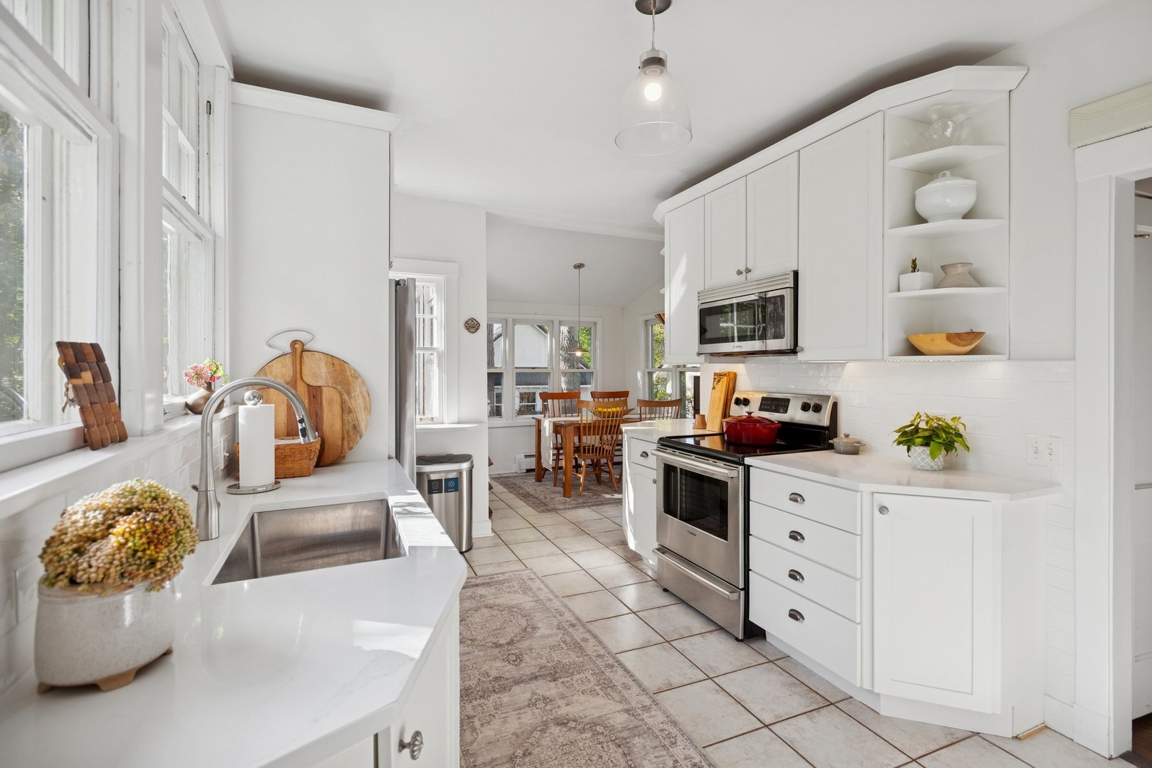 228 Poplar Street Winnetka, IL 60093 - Photo 9 of 34 a living room with furniture and a flat screen tv