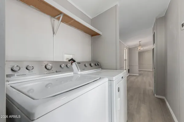 a utility room with dryer and washer