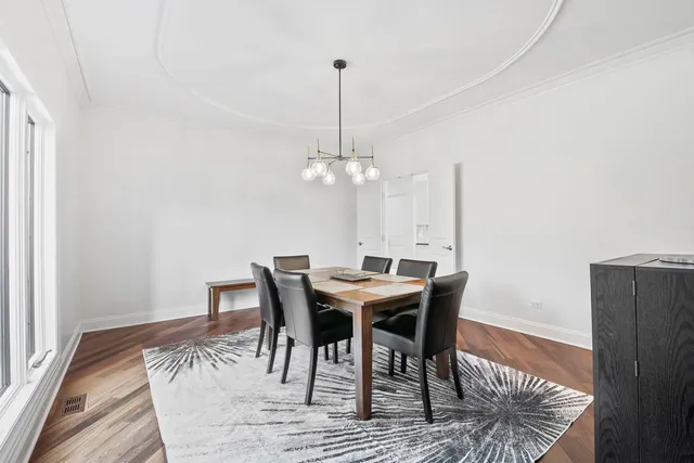an aerial view of residential house with outdoor space and parking
