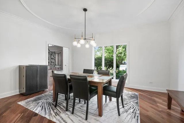 an aerial view of a house with outdoor space and street view