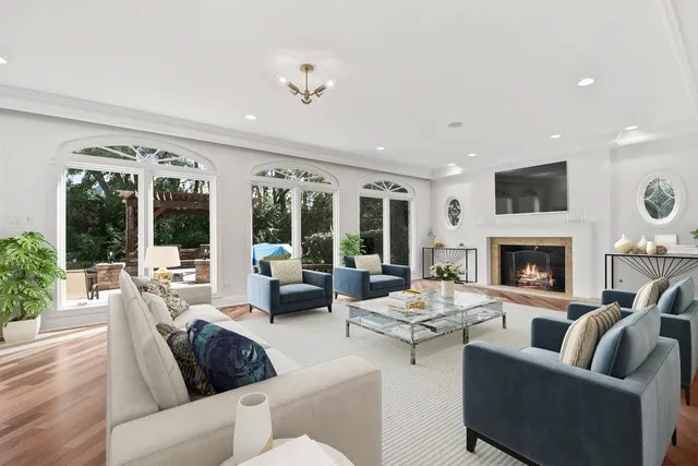 a spacious bathroom with a granite countertop sink and a mirror