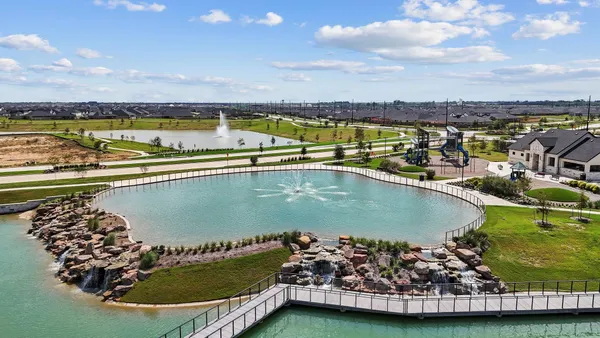 a view of a swimming pool with a lake view