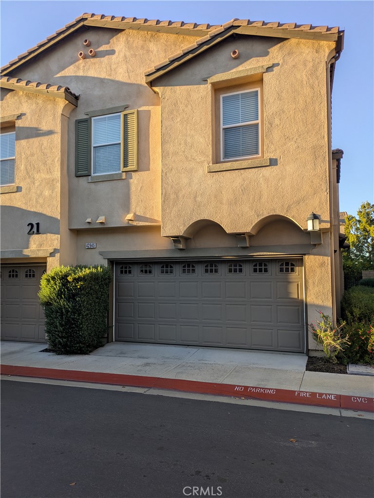 42945 Avenida Amistad Temecula, CA 92592 - Photo 1 of 32 View from the street. Corner unit.