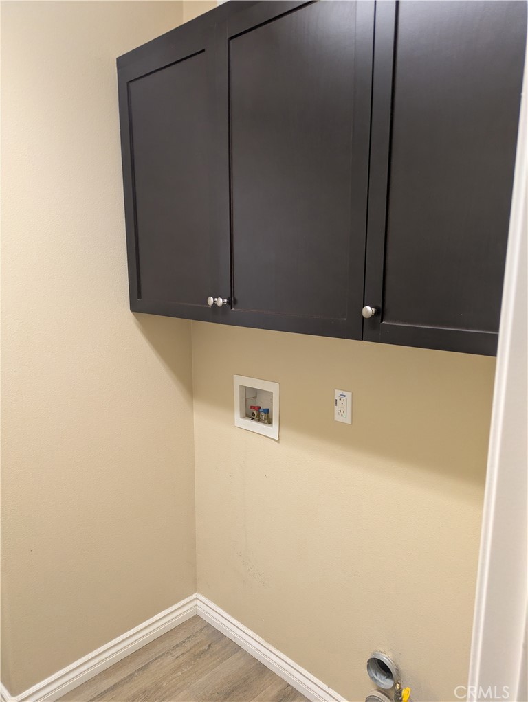 42945 Avenida Amistad Temecula, CA 92592 - Photo 13 of 32 Separate laundry room with overhead storage and direct garage access