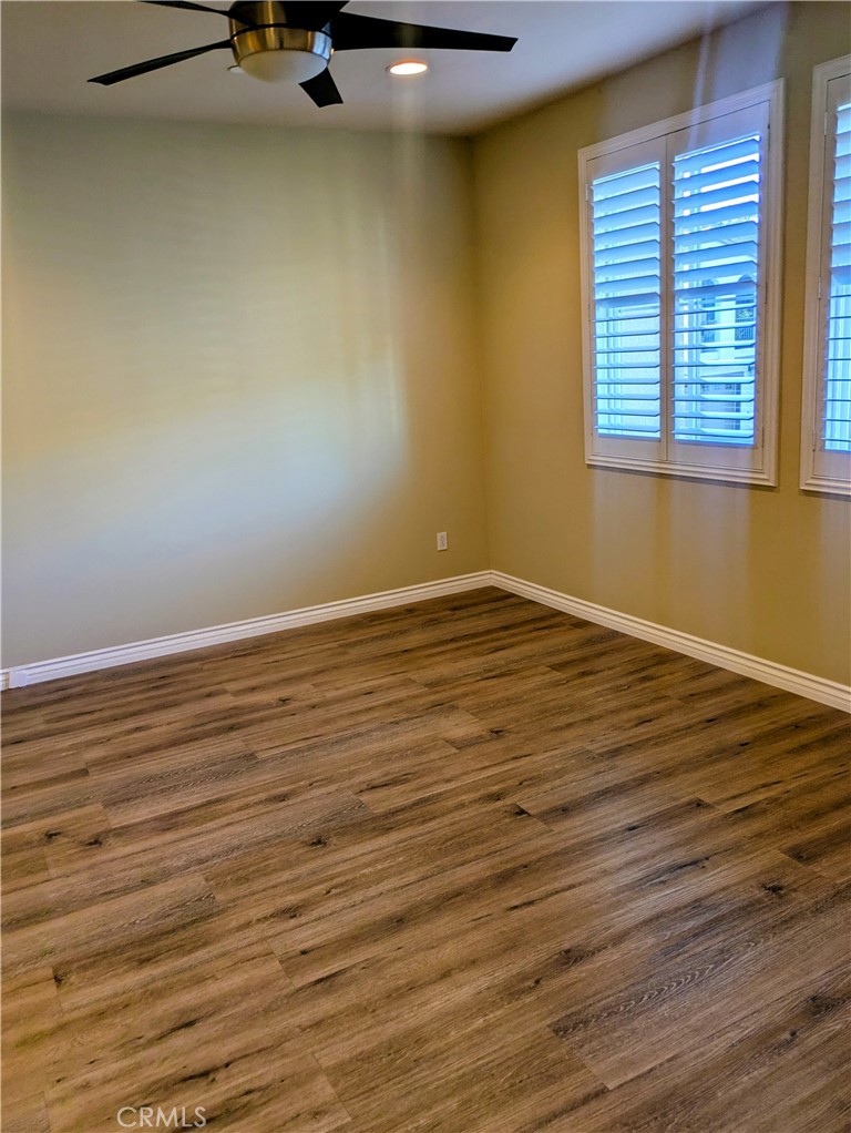 42945 Avenida Amistad Temecula, CA 92592 - Photo 14 of 32 Oversized primary bedroom with ceiling fan and plantation shutters