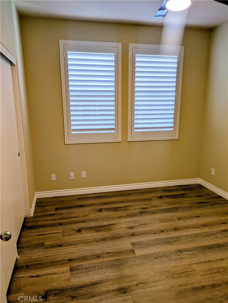 42945 Avenida Amistad Temecula, CA 92592 - Photo 22 of 32 Bedroom 3 with ceiling fan and plantation shutters