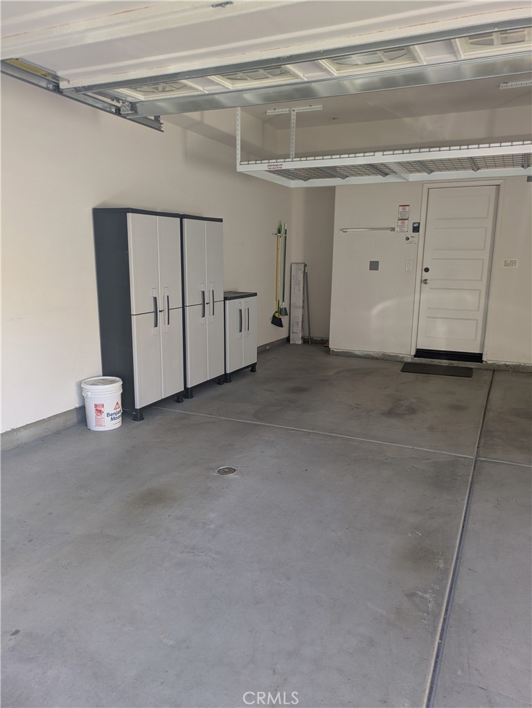 42945 Avenida Amistad Temecula, CA 92592 - Photo 27 of 32 Garage has storage cabinets