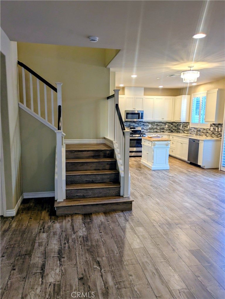 42945 Avenida Amistad Temecula, CA 92592 - Photo 4 of 32 Stepping into the great room. Living room area is to the right.