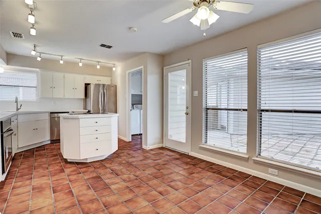 a view of kitchen with furniture and window