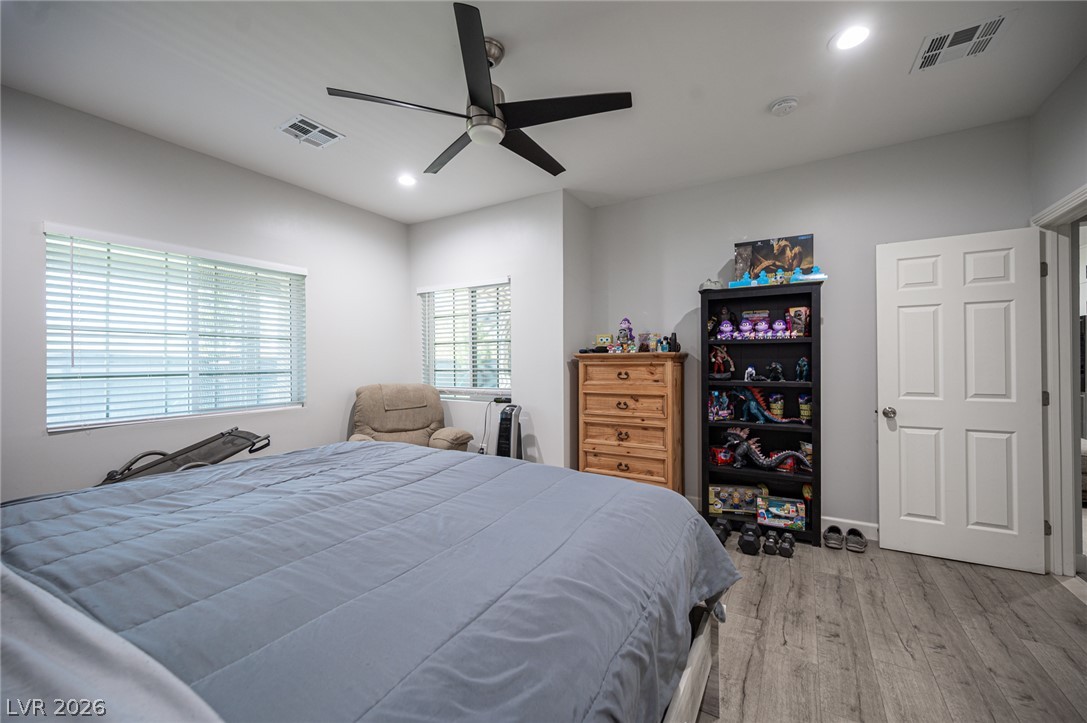441 Belville Road Pahrump, NV 89048 - Photo 30 of 44 Natural light filters into this bedroom, creating a tranquil atmosphere for rest and rejuvenation.