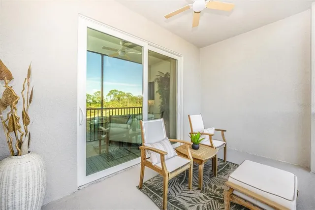 a bathroom with a sink vanity granite toilet and a mirror