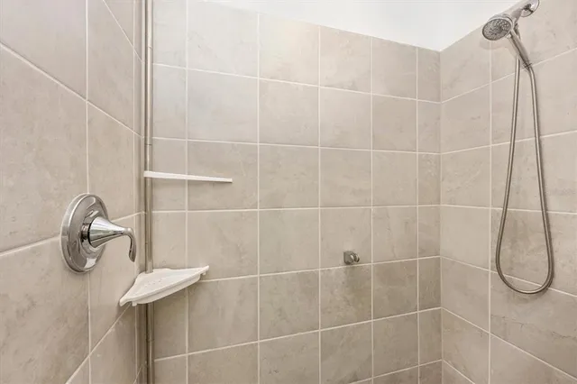 a view of swimming pool with outdoor seating and lake view