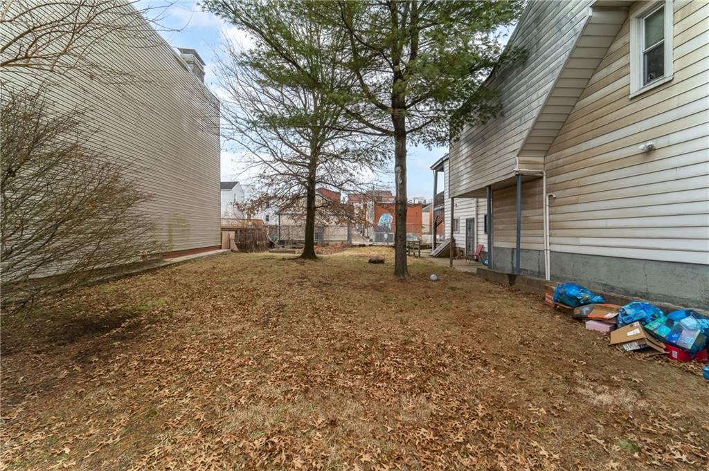 1009-1011 Chestnut Street Pittsburgh, PA 15212 - Photo 3 of 4 a view of backyard of the house