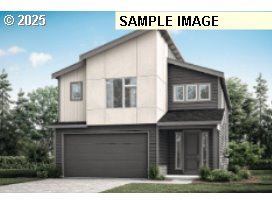 8700 South 1st Street, Unit 8 Ridgefield, WA 98642 - Photo 1 of 23 a front view of a house with garage