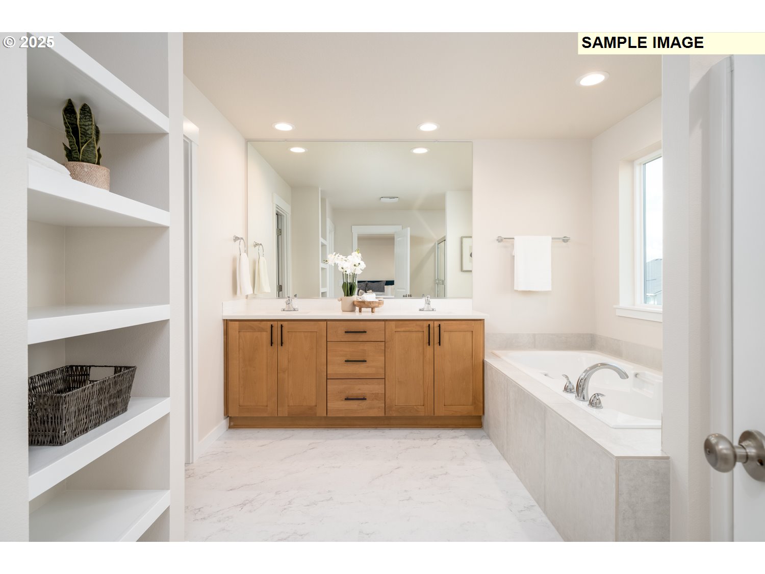 8700 South 1st Street, Unit 8 Ridgefield, WA 98642 - Photo 16 of 23 a bathroom with a tub a sink a mirror and a shower