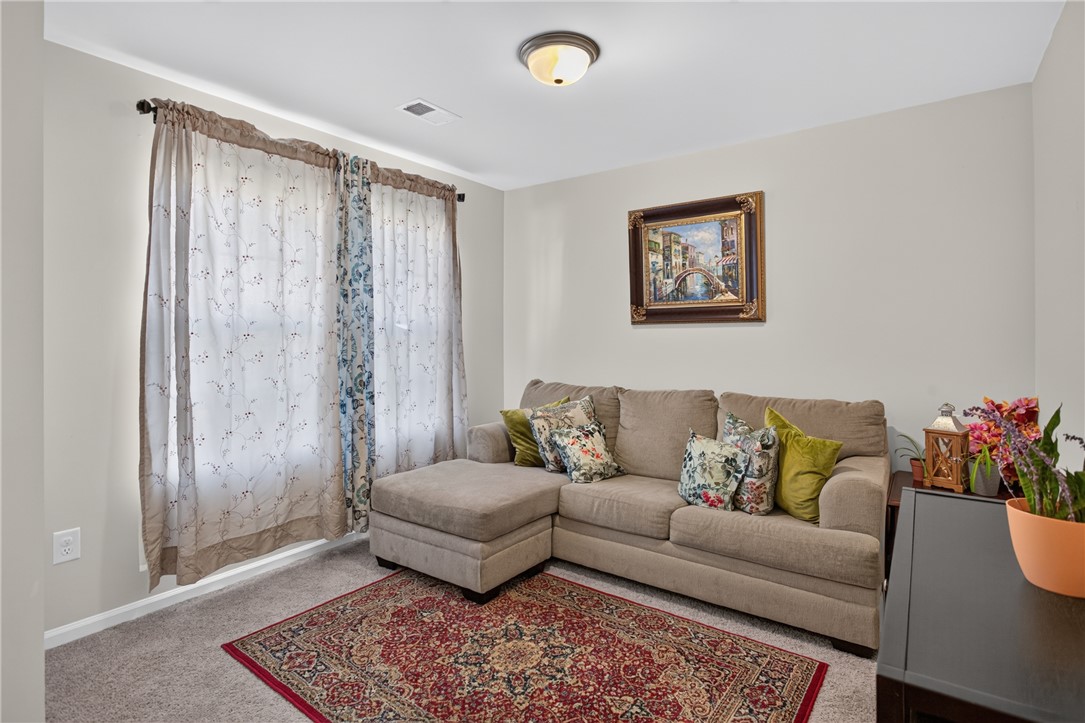 1081 Edenbrooke Circle Anderson, SC 29621 - Photo 19 of 46 A quiet, adaptable den or sitting room offers versatile living space for relaxation.