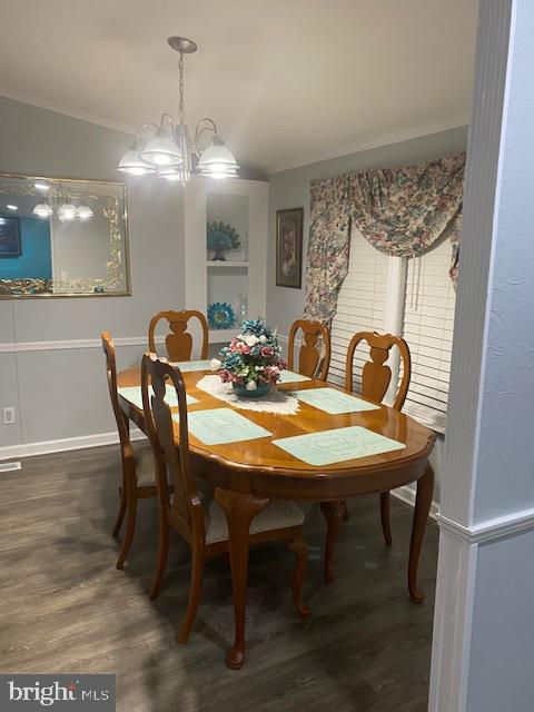 207 Poclain Road, Unit 207 Aberdeen, MD 21001 - Photo 12 of 20 a view of a dining room with furniture and chandelier