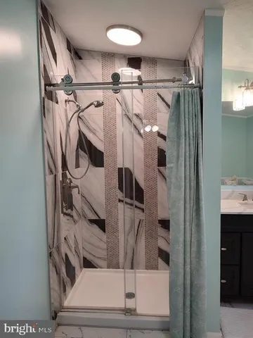 a view of a refrigerator and mirror