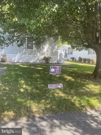 a view of a back yard of the green space