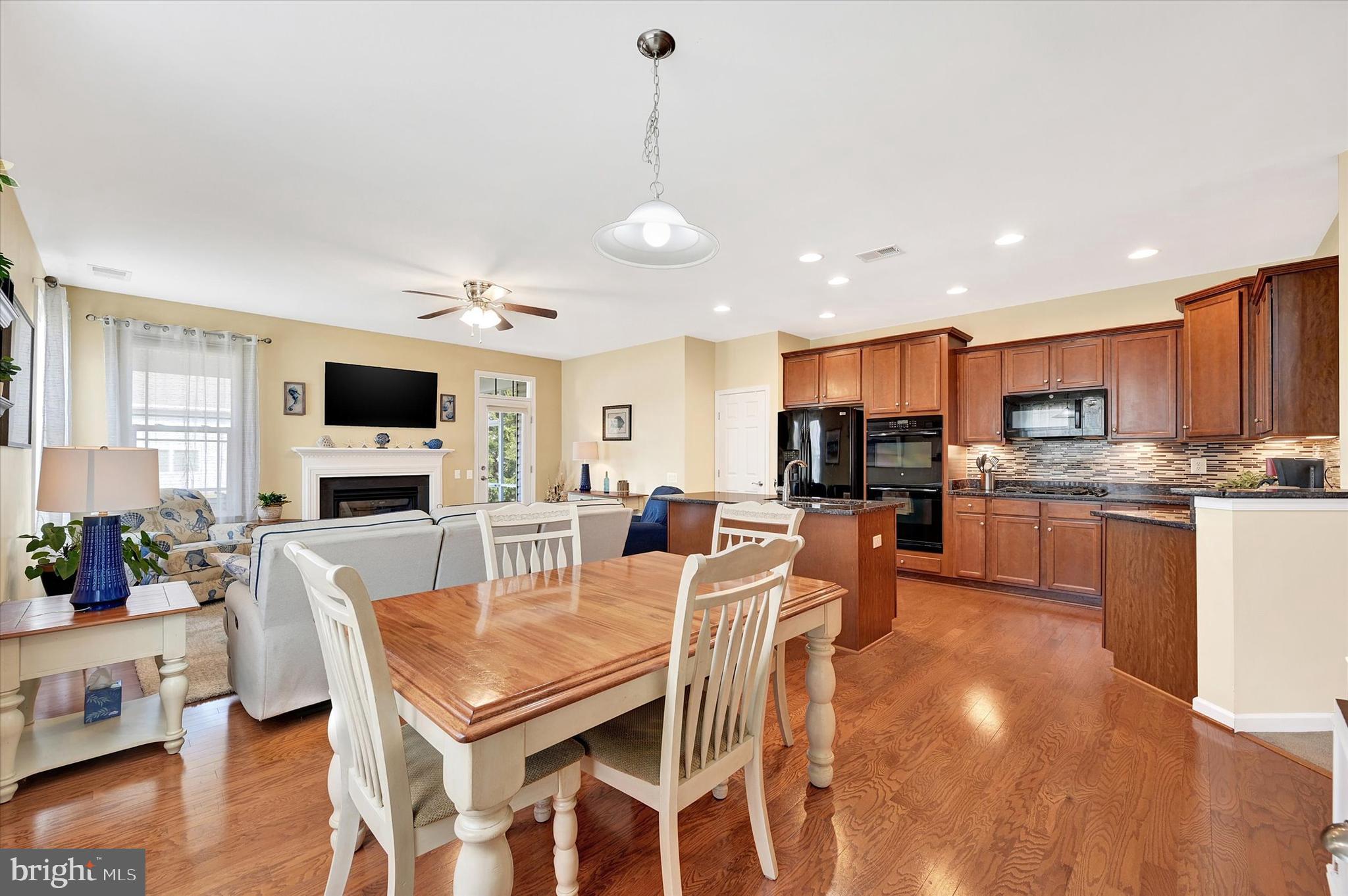 48 Canvasback Circle Bridgeville, DE 19933 - Photo 12 of 44 a view of kitchen with cabinets table and chairs