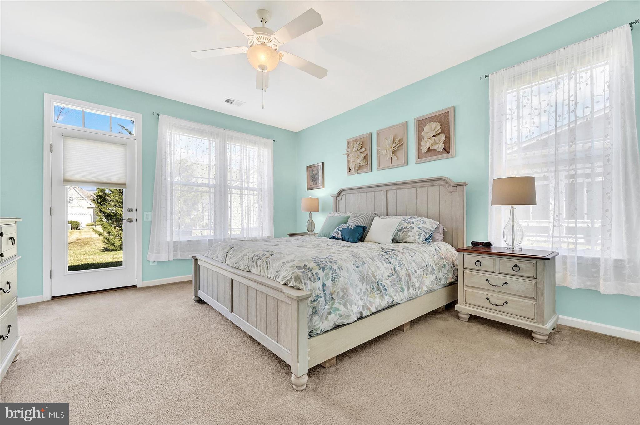 48 Canvasback Circle Bridgeville, DE 19933 - Photo 20 of 44 a spacious bedroom with a bed dresser and a window