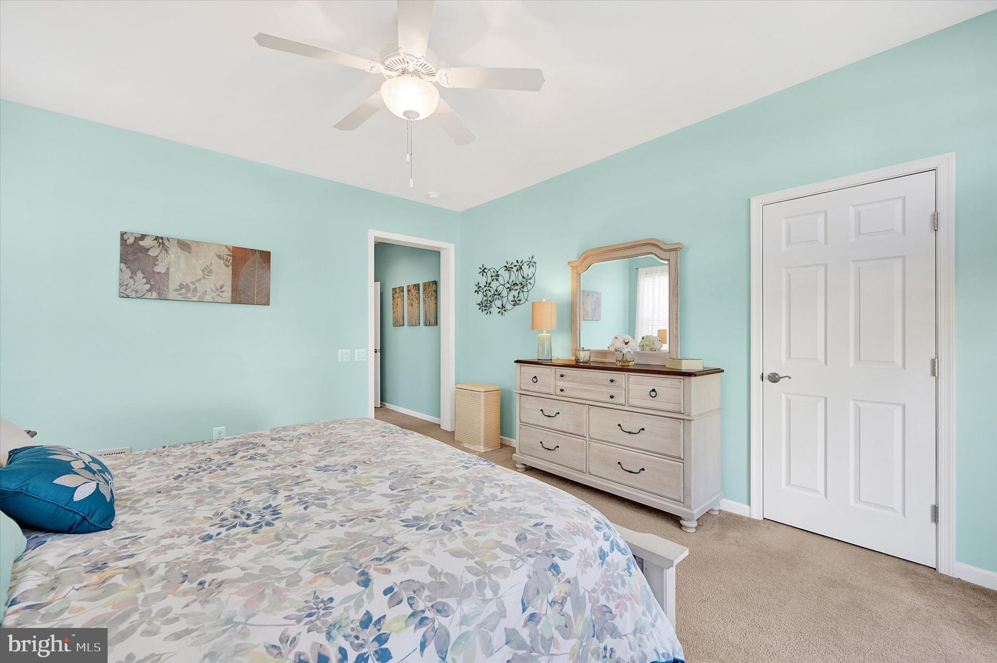 48 Canvasback Circle Bridgeville, DE 19933 - Photo 22 of 44 a bedroom with a bed and a dresser