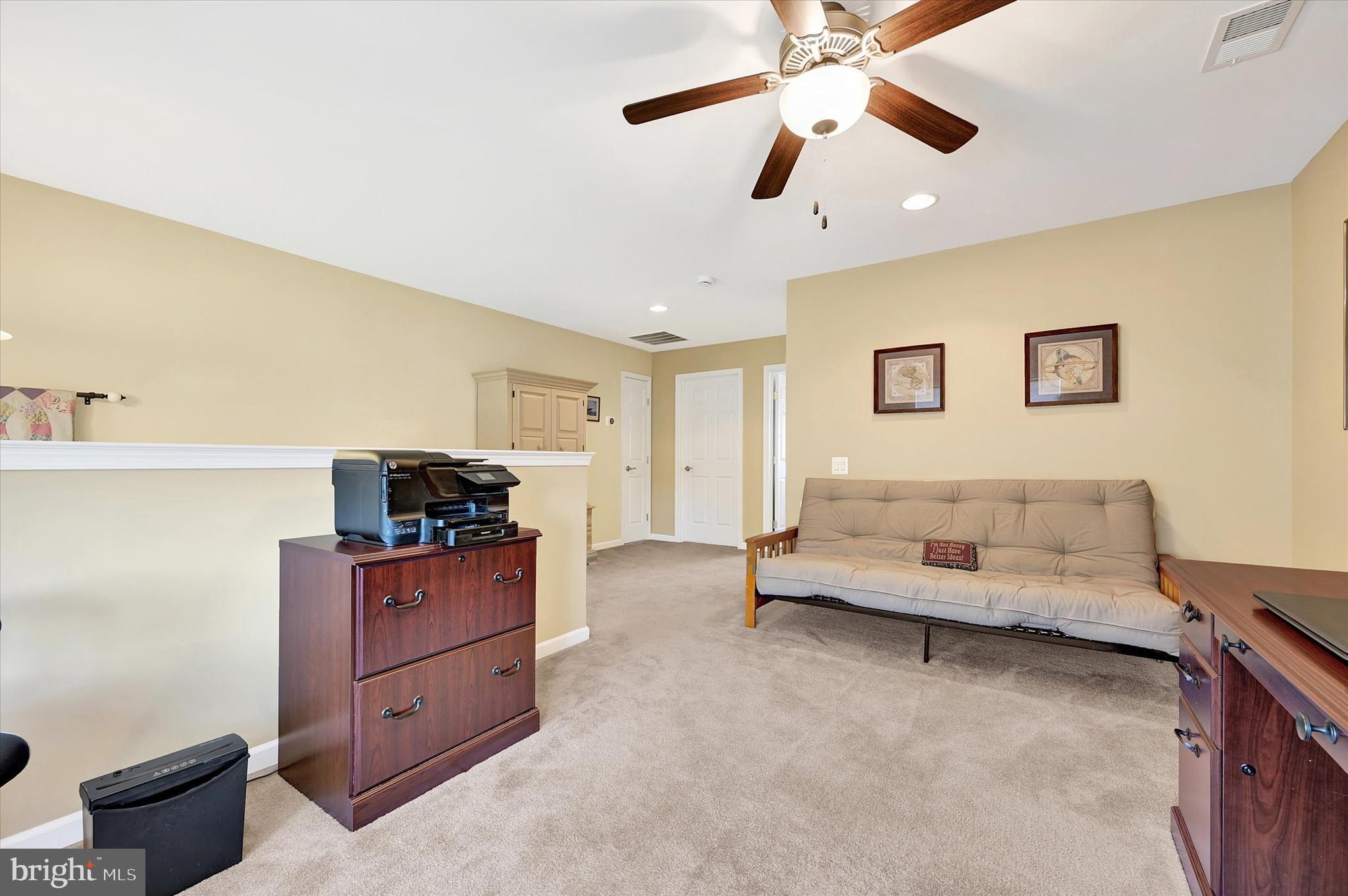 48 Canvasback Circle Bridgeville, DE 19933 - Photo 30 of 44 a living room with furniture and ceiling fan