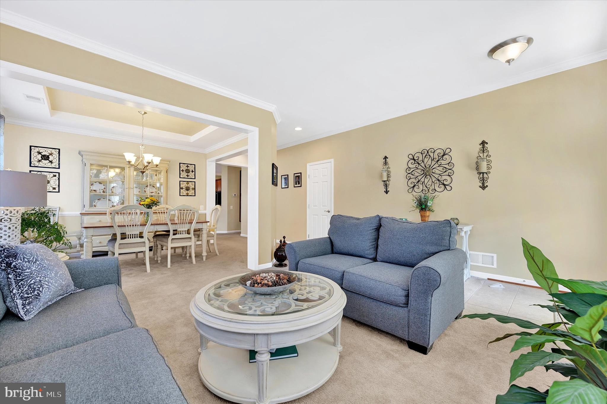 48 Canvasback Circle Bridgeville, DE 19933 - Photo 6 of 44 a living room with furniture and a dining table