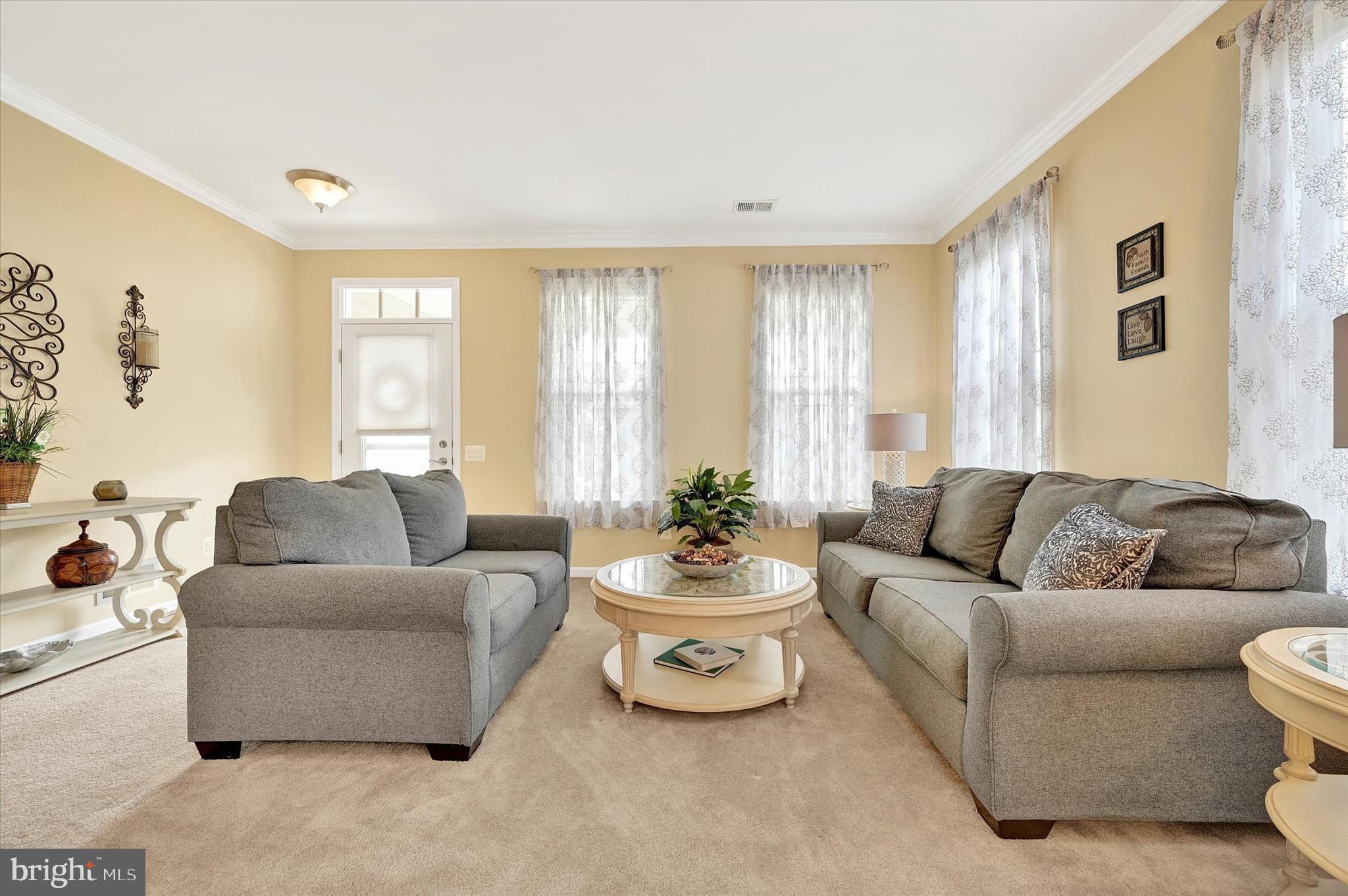 48 Canvasback Circle Bridgeville, DE 19933 - Photo 7 of 44 a living room with furniture and a large window