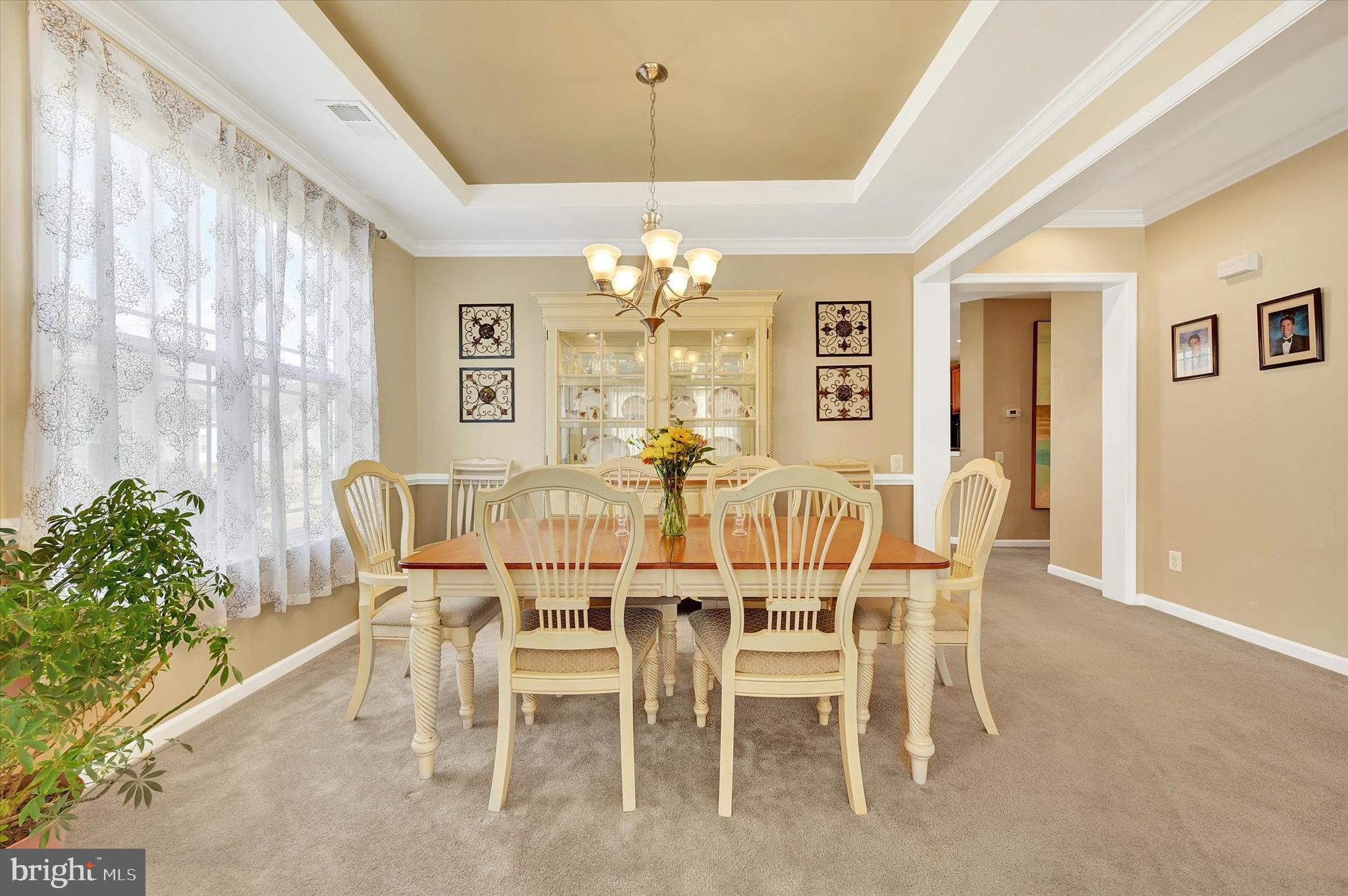 48 Canvasback Circle Bridgeville, DE 19933 - Photo 8 of 44 a dining room with furniture a chandelier and window