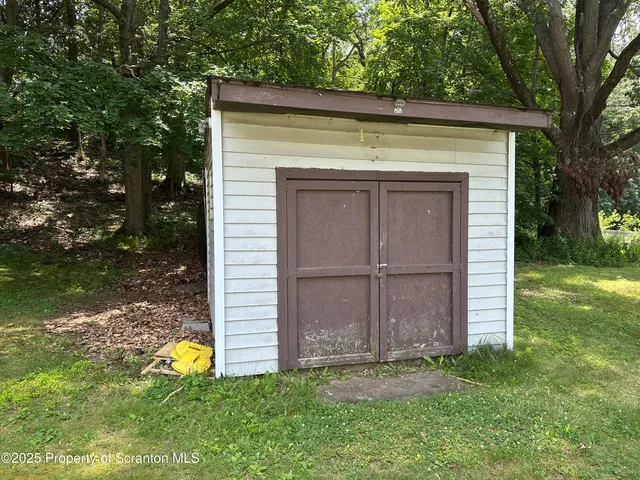a view of a backyard with a garden
