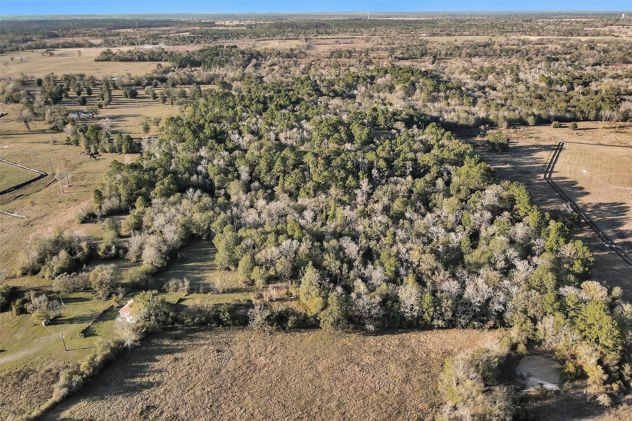 70 Mutt Young Road Huntsville, TX 77320 - Photo 23 of 35 an aerial view of residential house and lake view