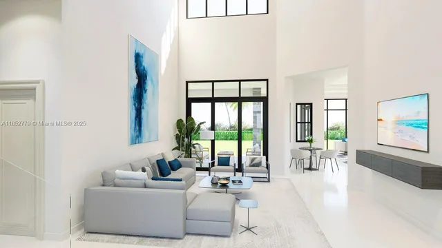 a living room with furniture and large windows