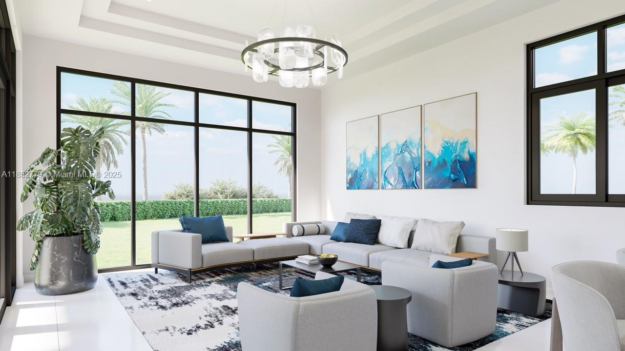 15141 Southwest 25th Street Fort Lauderdale, FL 33326 - Photo 8 of 9 a living room with furniture and a large window