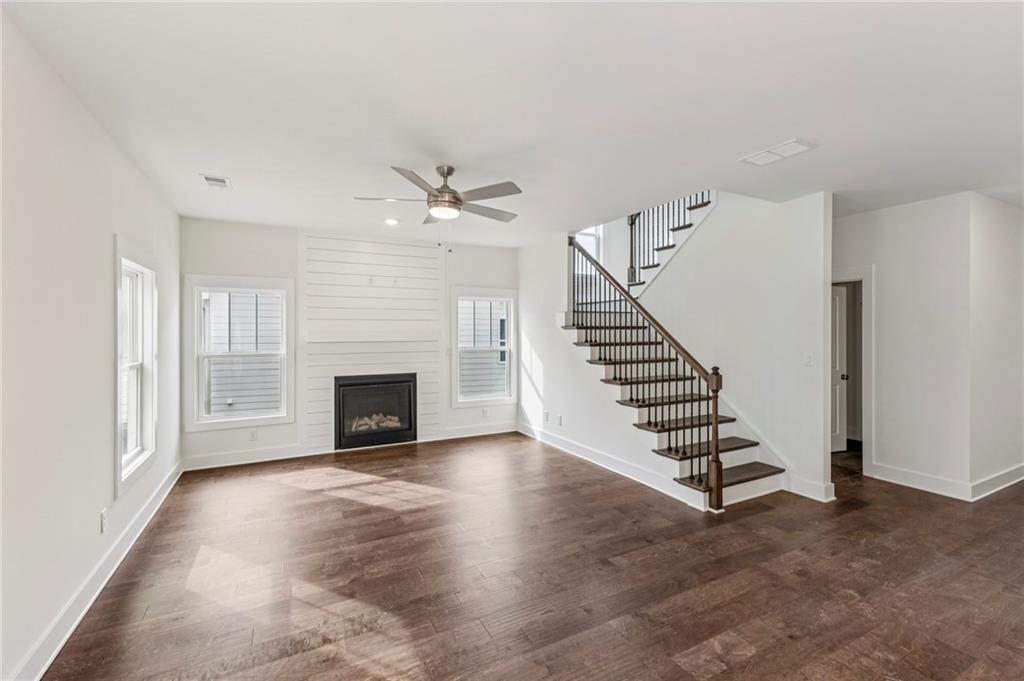 2637 Mills Bend Decatur, GA 30034 - Photo 2 of 14 a view of a livingroom with wooden floor staircase and a kitchen