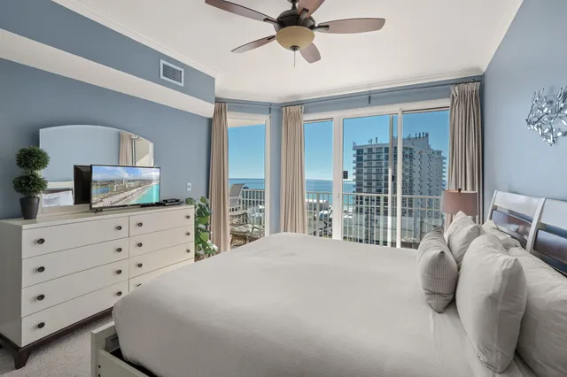 a white bath tub sitting next to a shower