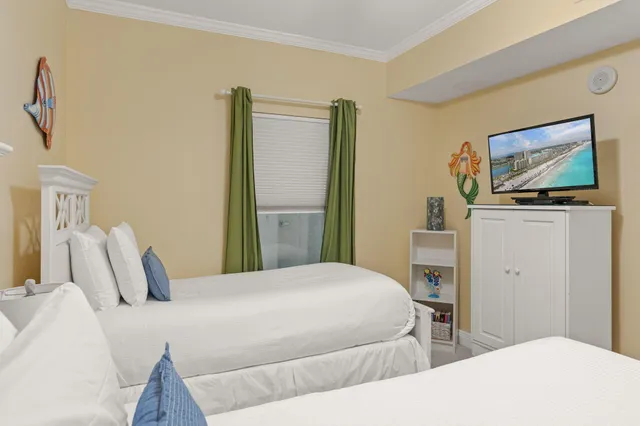 a bathroom with a sink a mirror a toilet and shower