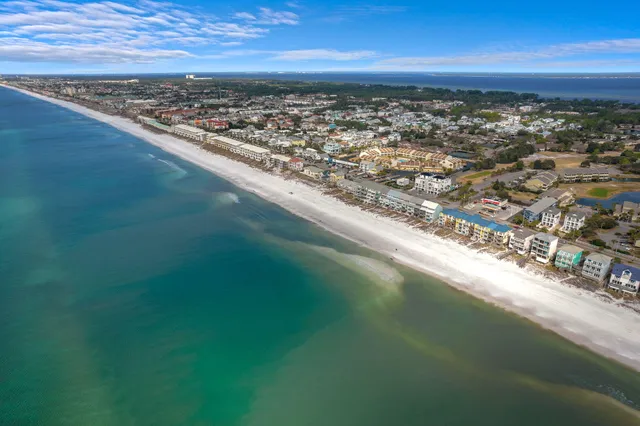a view of a city with lawn chairs