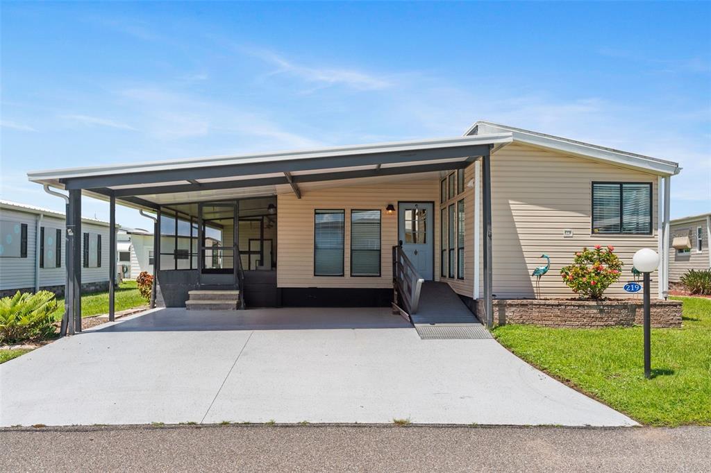 a front view of a house with a porch