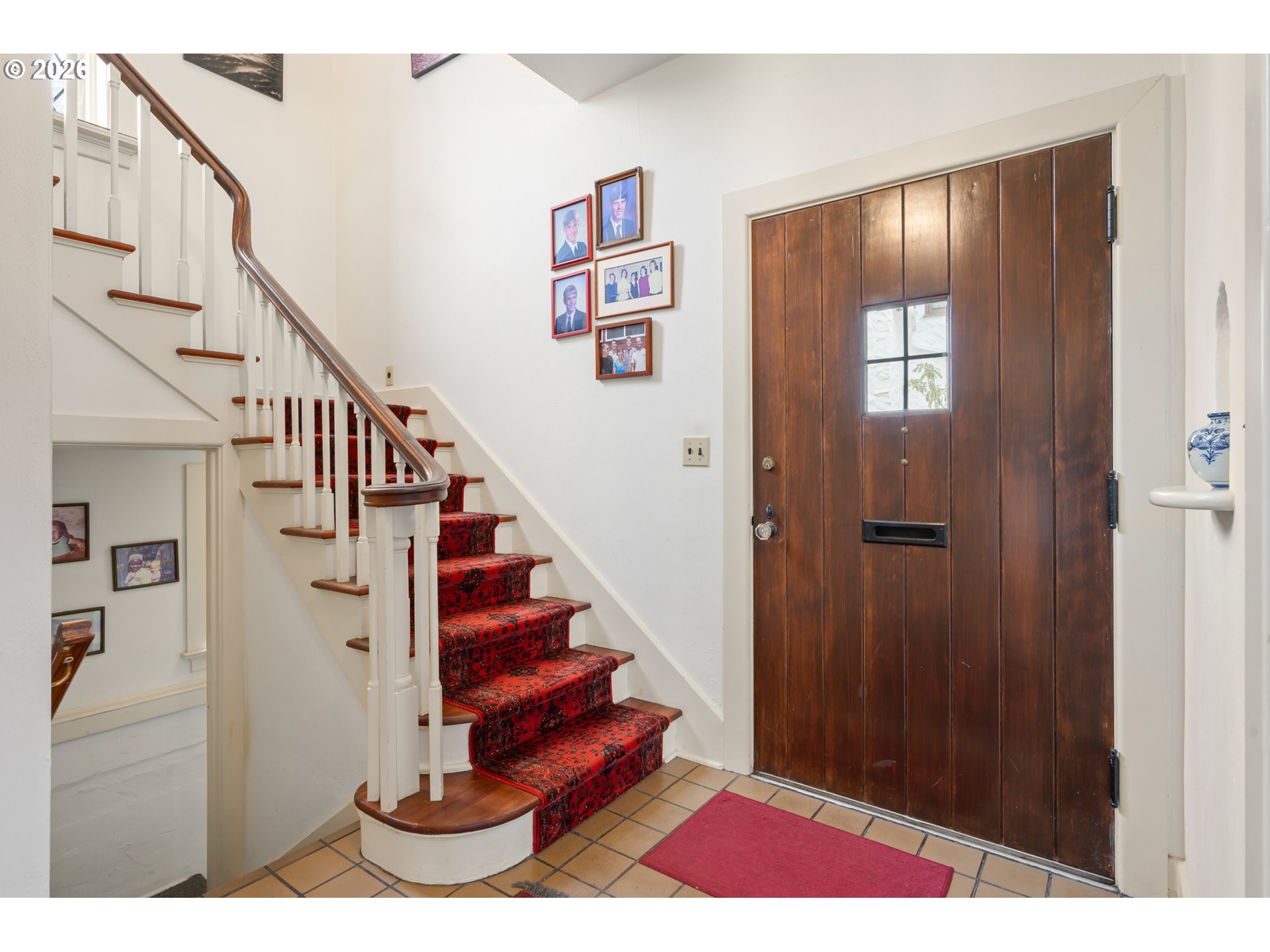 2223 Olive Street Eugene, OR 97405 - Photo 15 of 44 a view of entryway with wooden floor and stairs