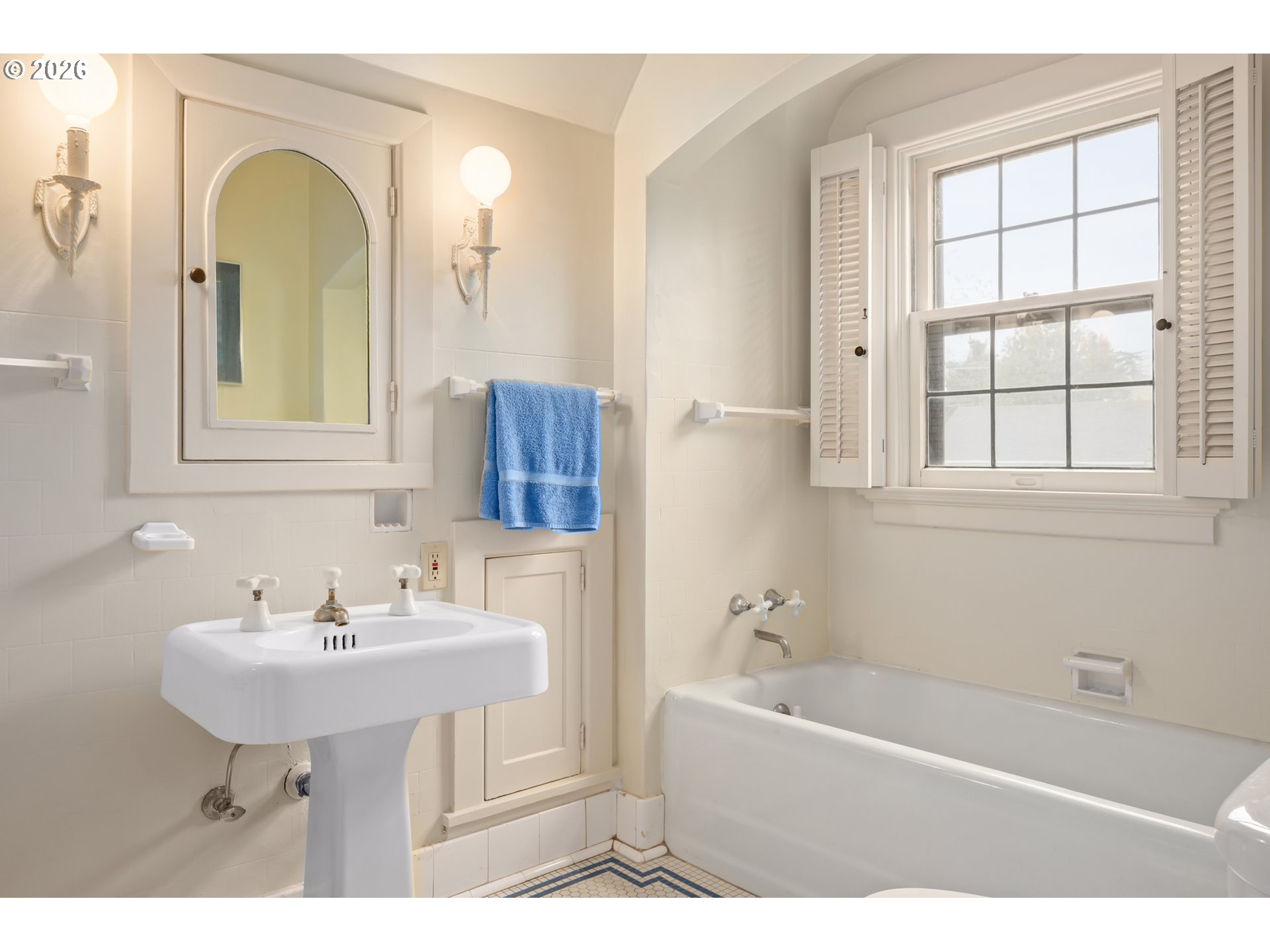 2223 Olive Street Eugene, OR 97405 - Photo 17 of 44 a bathroom with a sink and a bathtub
