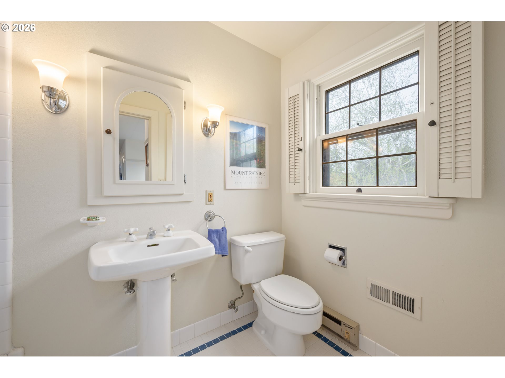 2223 Olive Street Eugene, OR 97405 - Photo 24 of 44 a bathroom with a sink toilet and mirror