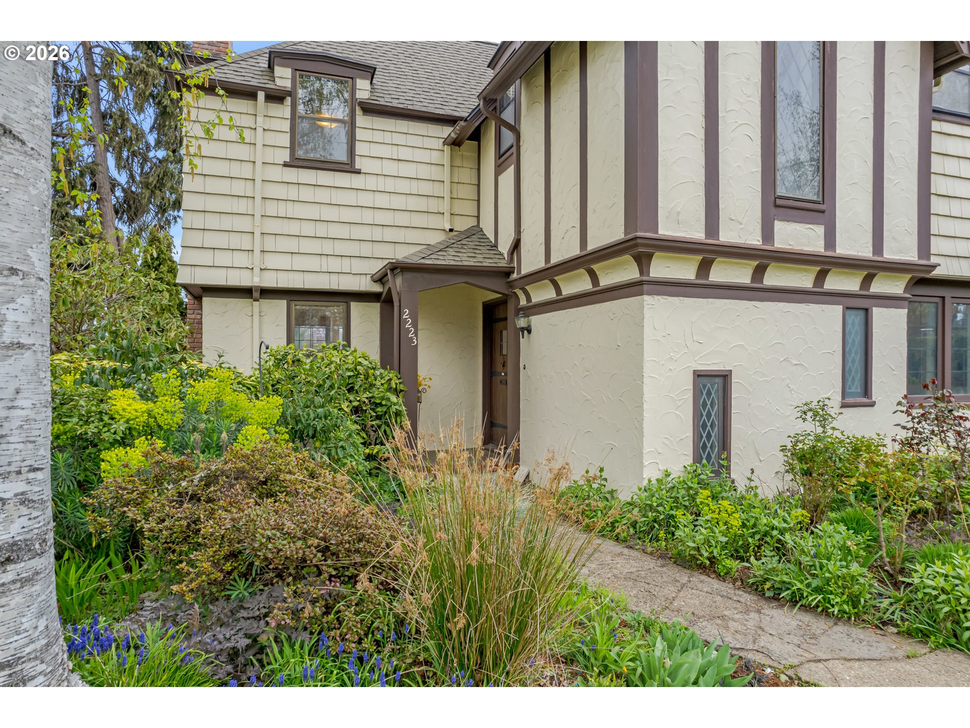 2223 Olive Street Eugene, OR 97405 - Photo 33 of 44 a view of a house with potted plants