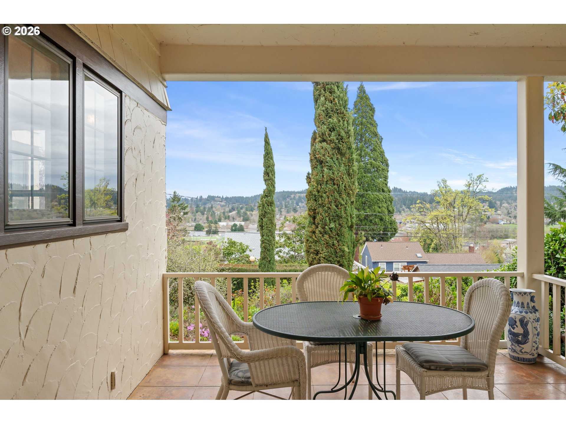 2223 Olive Street Eugene, OR 97405 - Photo 39 of 44 a balcony view with a lot of furniture and a potted plant