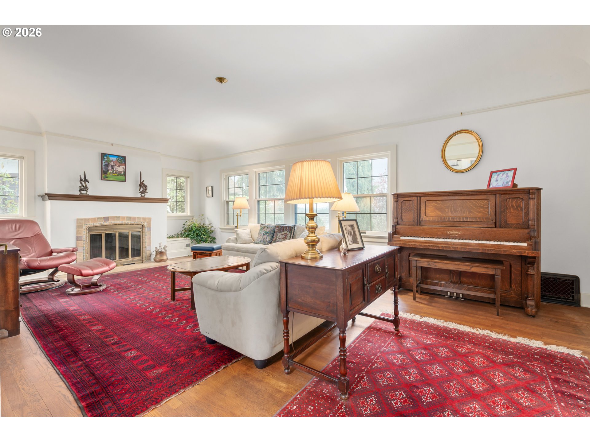 2223 Olive Street Eugene, OR 97405 - Photo 4 of 44 a living room with furniture a fireplace and a table