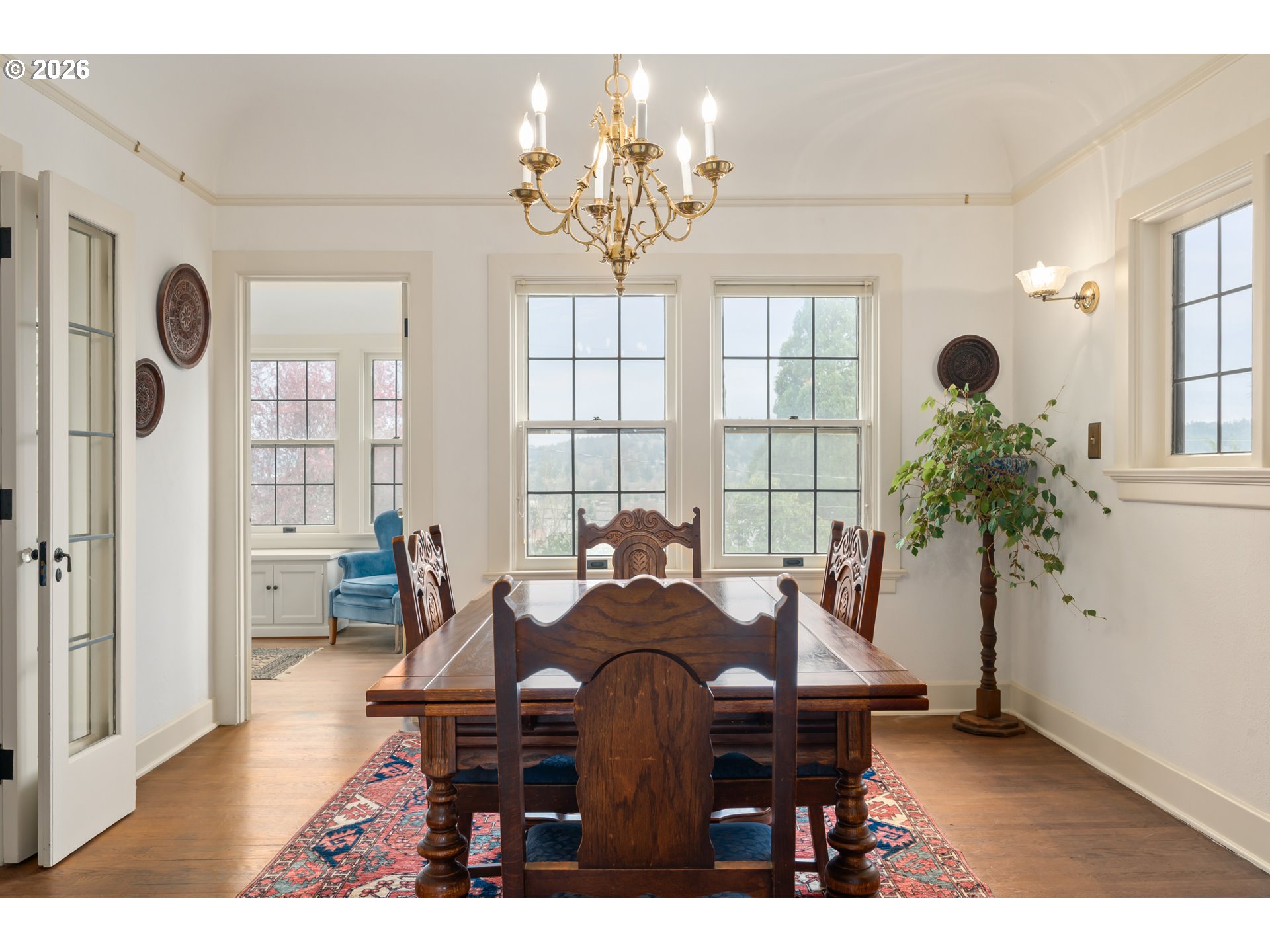 2223 Olive Street Eugene, OR 97405 - Photo 6 of 44 a living room with furniture and a chandelier